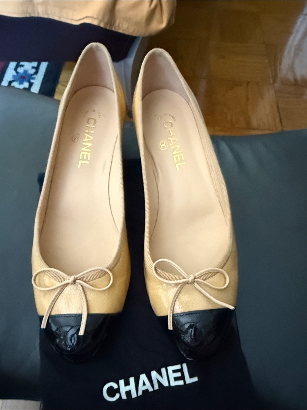 CHANEL Two-Tone Beige and Black Cap-Toe Ballet with kitten heels